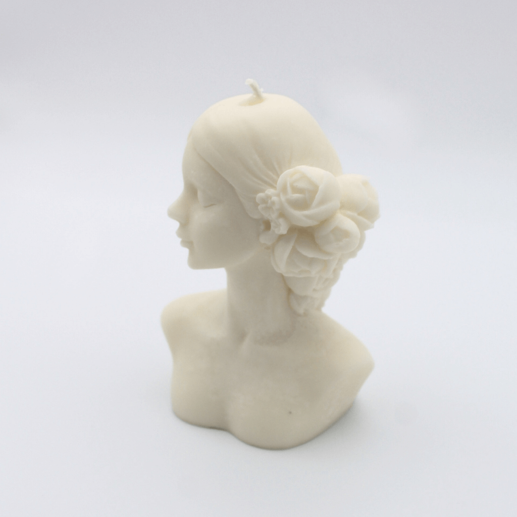 Female statue with roses